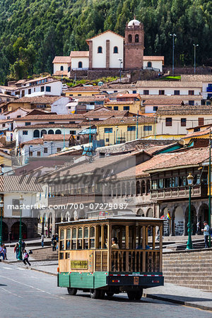Trolley bus at Plaza de Armas and houses in background, Cusco, Peru Trolley bus at Plaza de Armas and houses in background, Cusco, Peru