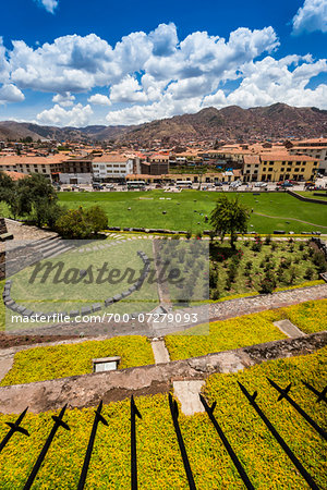 Overview of garden and grounds at Qurikancha, Convent of Santo Domingo, and street scene in background, Cusco, Peru Overview of garden and grounds at Qurikancha, Convent of Santo Domingo, and street scene in background, Cusco, Peru