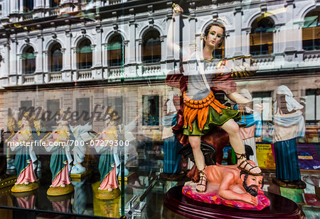 Reflection in Shop Window selling Religious Items, Quito, Ecuador