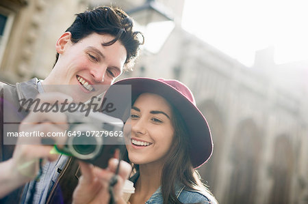 Young couple with vintage camera