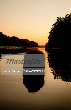 Man's head submerged in water, Berlin, Germany