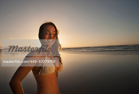 Portrait of woman on beach smiling, Lanzarote, Canary Islands, Spain