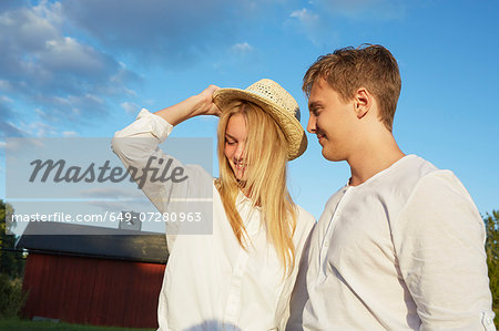 Happy young couple enjoying sunshine