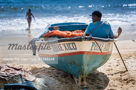 Fisherman in Boat, Copacabana Beach, Rio de Janeiro, Brazil