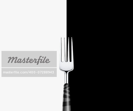 Sharp metal fork on white and black background