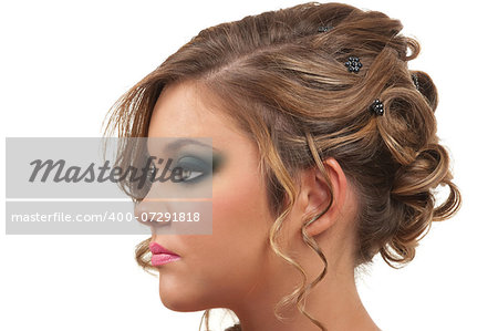 Young woman with beautiful hair do and smokey eye make up