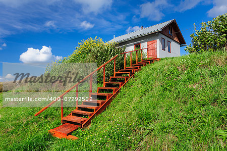 Small house with stairs, in the Kindasovo village, Karelia, north of Russia