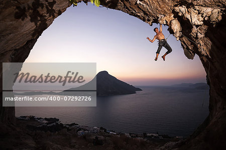 Rock climber at sunset. Kalymnos Island, Greece.