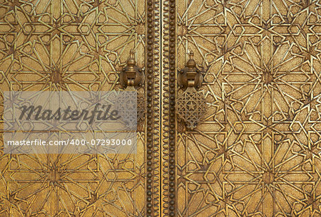 Detail of the ornate doors and door knockers at the Royal Palace in Fes, Morocco