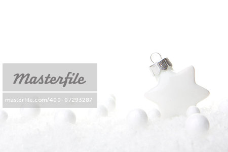 white christmas bauble as christmas star on snow