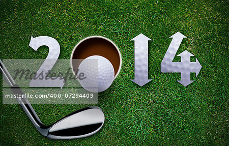 Happy New Golf year 2014,  Golf ball and putter on green grass, the same concept available for 2015, 2016 and 2017 year.