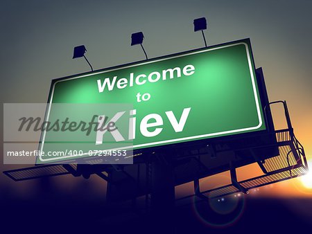 Welcome to Kiev - Green Billboard on the Rising Sun Background.