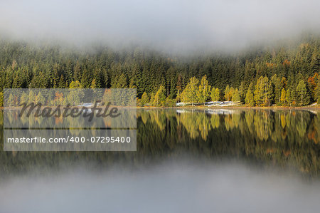 Autumn landscape at Saint Anna Lake which is located in a volcanic crate from Romania