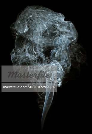 Smoke on black background. Swirls and art