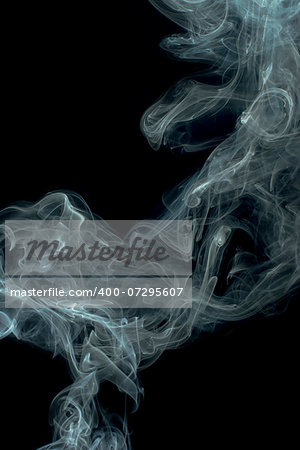 Smoke on black background. Swirls and art