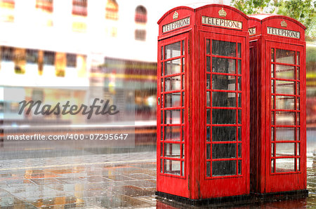 Red Phone cabines in London.Rainy day. Vintage phone cabine monumental