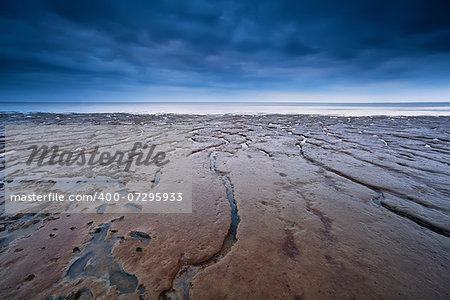 texture on mud at low tide of North sea, Moddergat, Netherlands