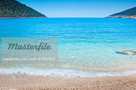 idealistic sea cove with turquoise water