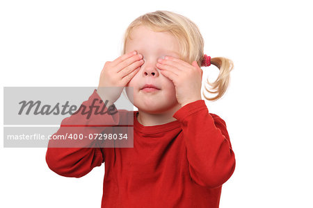 Portrait of a young girl covering her eyes on white background