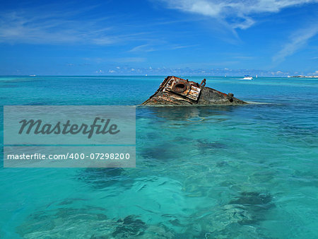 One end of a ship wreck (the Vixen) coming out of a tropical Sea - Square