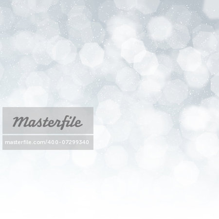 Blurred bokeh christmas background with snowflakes