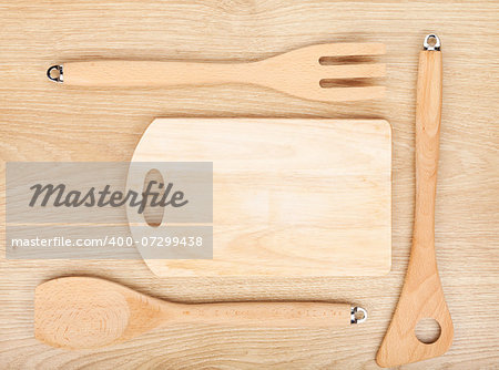 Kitchen utensils on wooden table