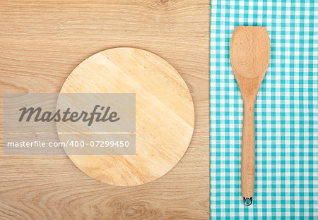 Kitchen utensils on wooden table with copy space
