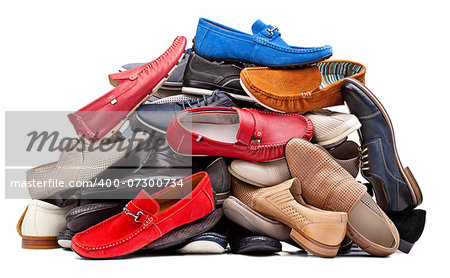 Pile of various men shoes, with clipping path