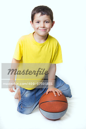 Child with a basketball ball.