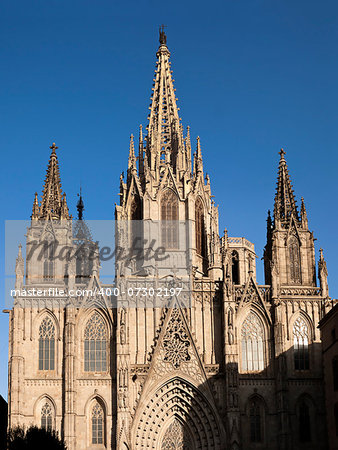 Facade and towers of the gothic cathedral of Santa Eulalia, or Seu in Barcelona, Catalonia, Spain.