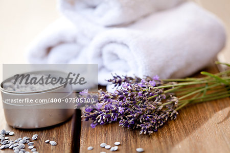 fresh lavender white towel and bath salt on wooden background wellness spa healthcare