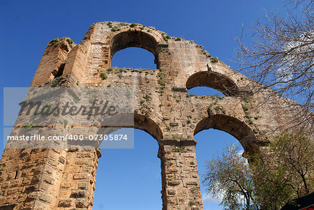This is ancient ruins of aqueduct.  Aspendos or Aspendus  was an ancient Greco-Roman city in Antalya province of Turkey.