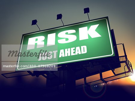 Risk Just Ahead - Green Billboard on the Rising Sun Background.