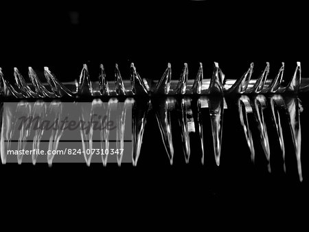 Metal Forks Lined Up In An Abstract Way