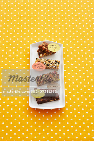 Energy Bars on Tray with French Labels on Polka-dot Background