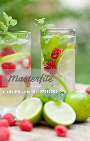 fresh cold drink water ice cubes peppermint lime raspberry outdoor summer