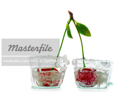 two ice cubes with cherry