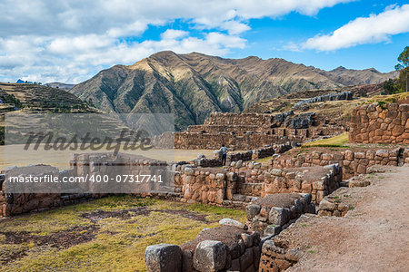 Tourist at Chincheros, incas ruins in the peruvian Andes at Cuzco Peru