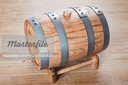 vintage oak wine barrel on old wooden table
