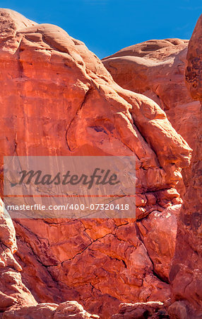 Orange Rock Canyon Man Patterns in the Rock Arches National Park Moab Utah USA Southwest.