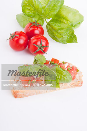 deliscious fresh bruschetta appetizer with tomatoes isolated on white background