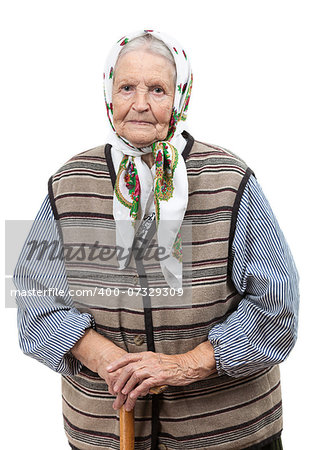 Portrait of a smiling senior woman looking at the camera. Over white background.