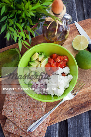 Ingredients for avocado and feta cheese salad