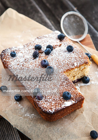 Homemade blueberry cake on wooden table