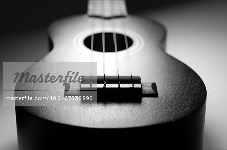 Close-up of texture on a ukulele. Black and White image.