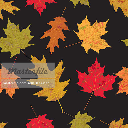A seamless tileable illustration of colorful autumn leaves against a black background. Vector EPS 10 available.