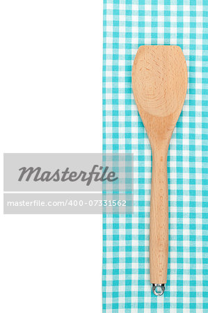 Kitchen utensil over towel. Isolated on white background