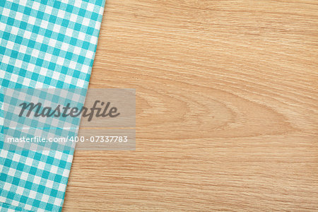 Kitchen towel on wooden table with copy space