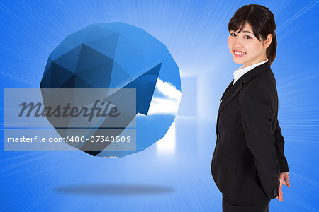 Smiling businesswoman against bright blue hall