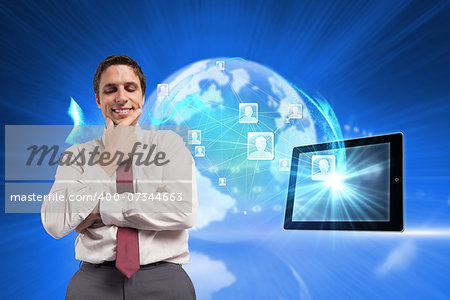 Thoughtful businessman with hand on chin against global technology background
